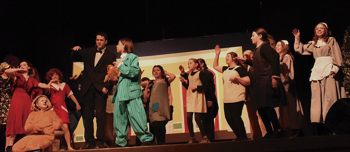 The cast of "Annie Jr." closes last week's performance with their original "Chicken Rap." (Berl Tiskus/Leader)