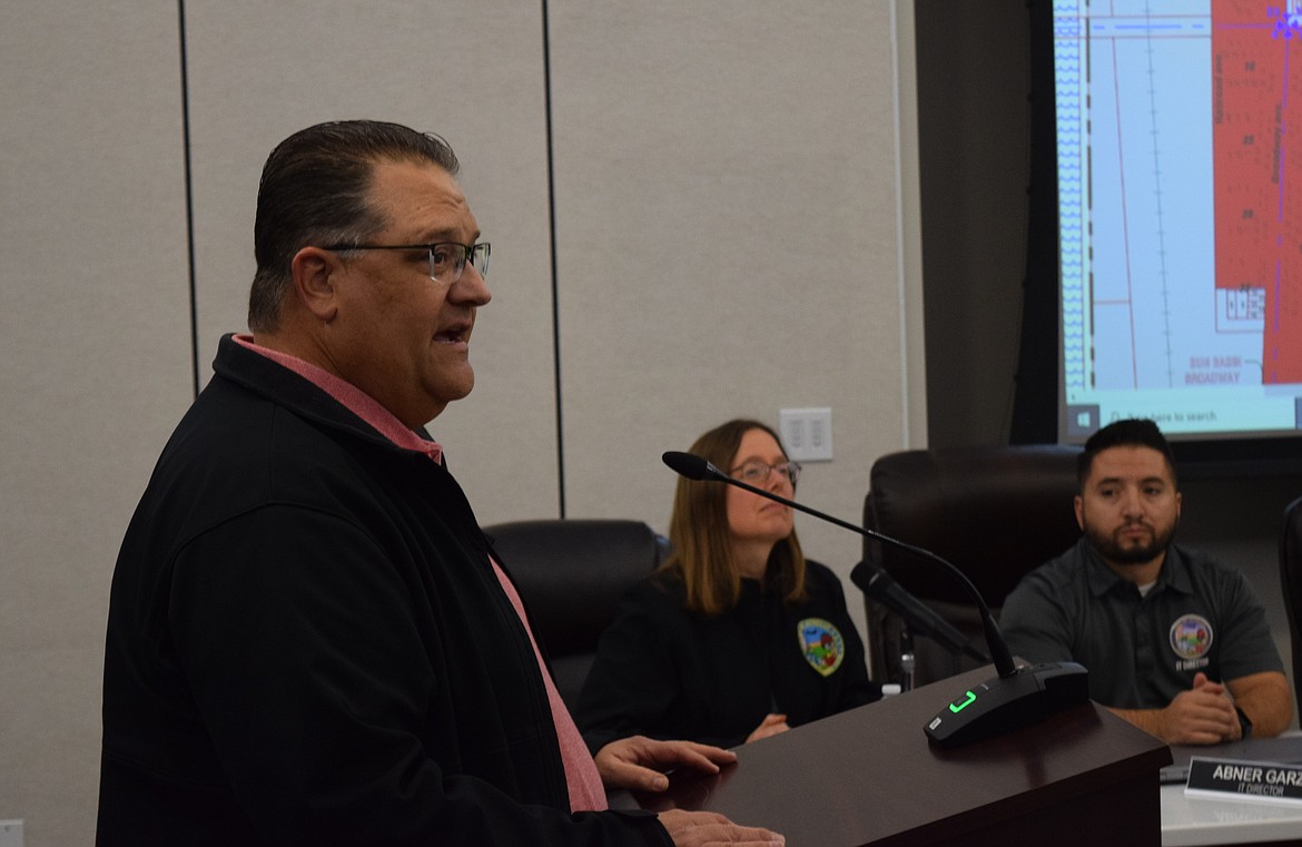 Othello Planning Commissioner Chris Dorow explains to Othello City Council the context behind potentially allowing temporary cargo container storage on certain city properties that do no currently allow them.