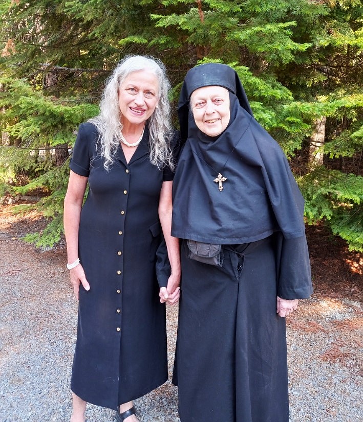 (left) Glenda Novinger, current director of the Bonners Ferry Community Orchestra visits with Sabira Van Adel (previously Sabira Jackson), who founded the orchestra and was its first director. Sabira visited Bonners Ferry this August from the Holy Myrrhbearers' Monastery in Otego, NY.