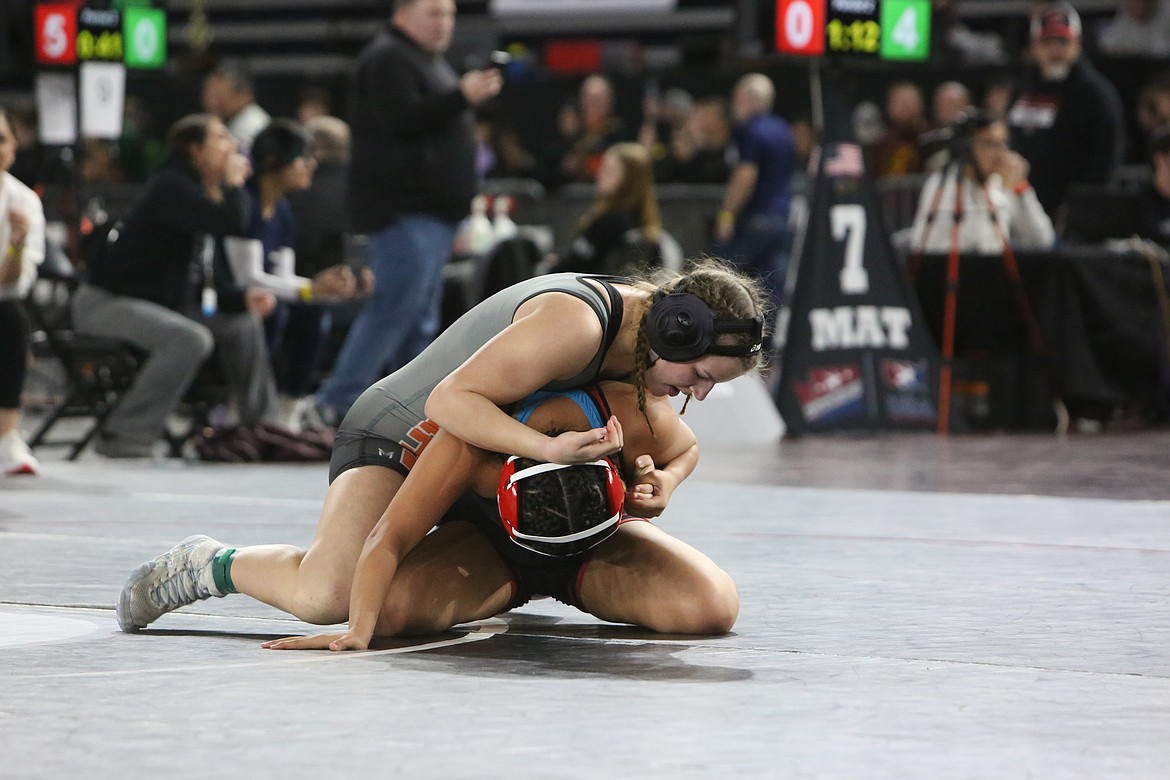 Ephrata senior Kadie McMullen, top, finished second in the 155-pound bracket at the Eastmont Ladycats Invite last weekend.