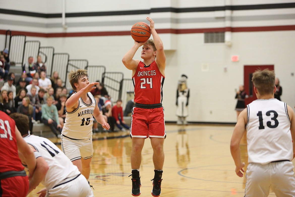 Lind-Ritzville/Sprague senior Brock Kinch (24) takes a jump shot in the fourth quarter against Almira/Coulee-Hartline.