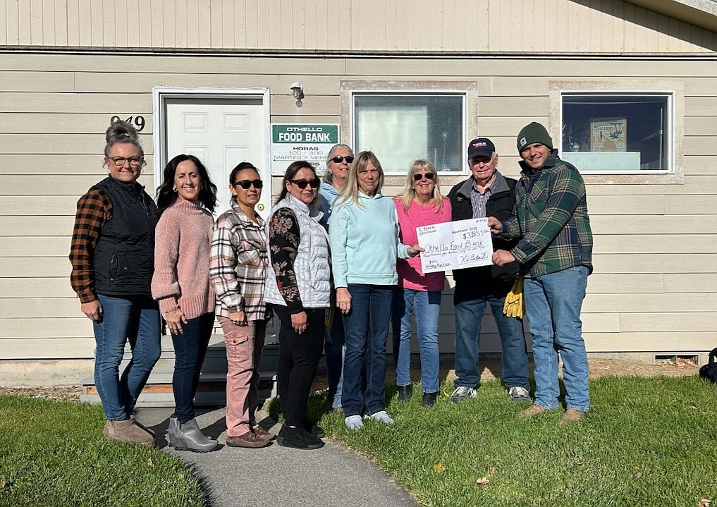 Kristine Robertson, Guiomar Azevedo, Sheila Simmons, Blanca Garcia, Terry Eagy, Linda Brady, and Debbie Pegram, Food Bank volunteer Terry Thompson and Facilities Director Jose Garza worked together via their group Xi Beta Xi to raise money for their local food bank.