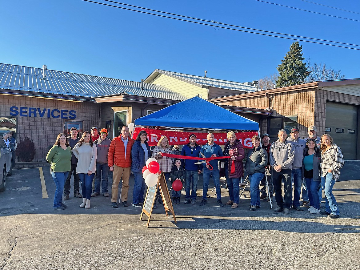 The Bonners Ferry Chamber of Commerce welcomed its newest business on Nov. 17 at Accurate Northwest’s grand opening. More than 80 people stopped by in the afternoon to wish owners Eric and Cory Donenfeld, and their local crew, good luck in their new venture. Chamber representative Jennifer Van Etten, left, holds up the ribbon while another chamber member, Wendy Hawks, holds up the right side. Cory and Eric are in the middle behind the ribbon. Accurate Northwest is located at 6818 Denver in Bonners Ferry and can be reached at 208-267-2432.