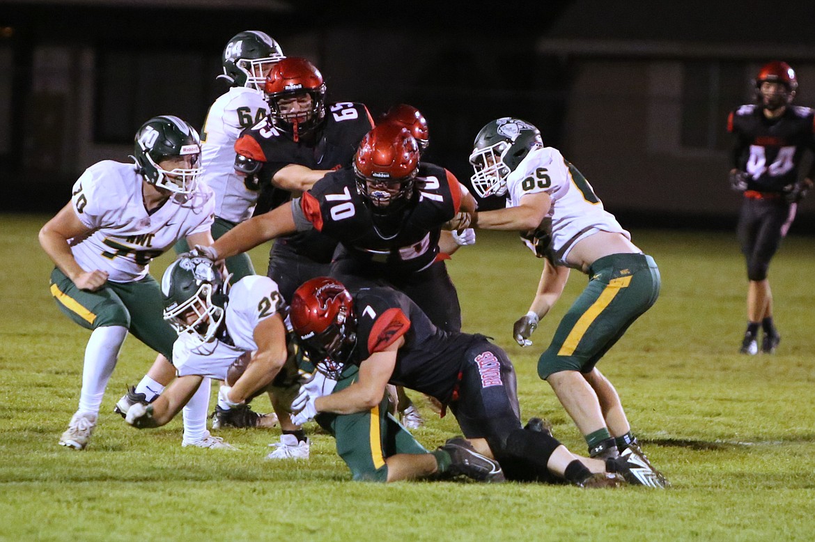 Lind-Ritzville/Sprague defenders tackle a Northwest Christian (Colbert) player. The Broncos went 5-5 this fall, missing the 2B state tournament after falling to Okanogan in their crossover game.