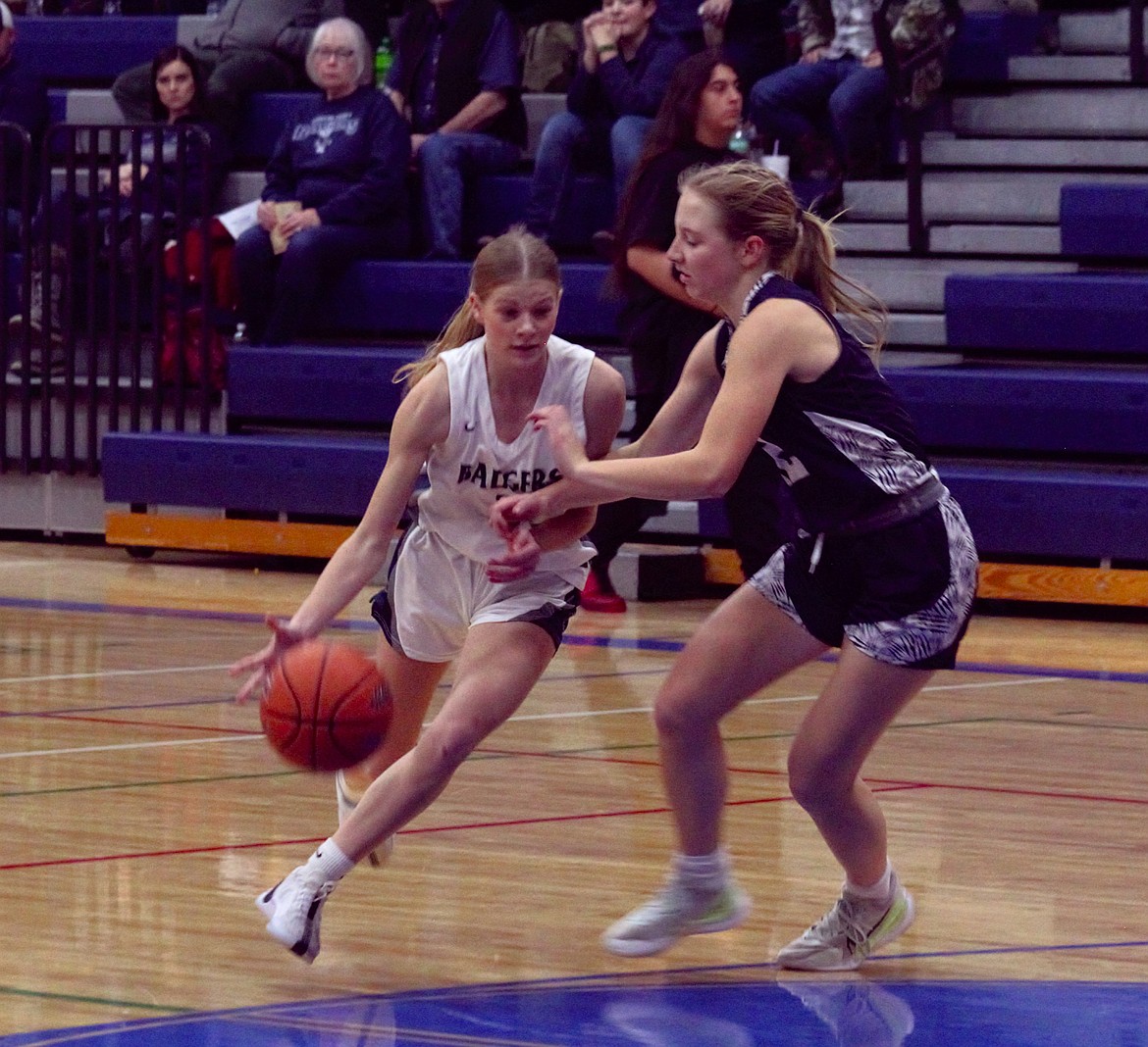 Makenna Baisden drives to the hoop against Stillwater Christian.