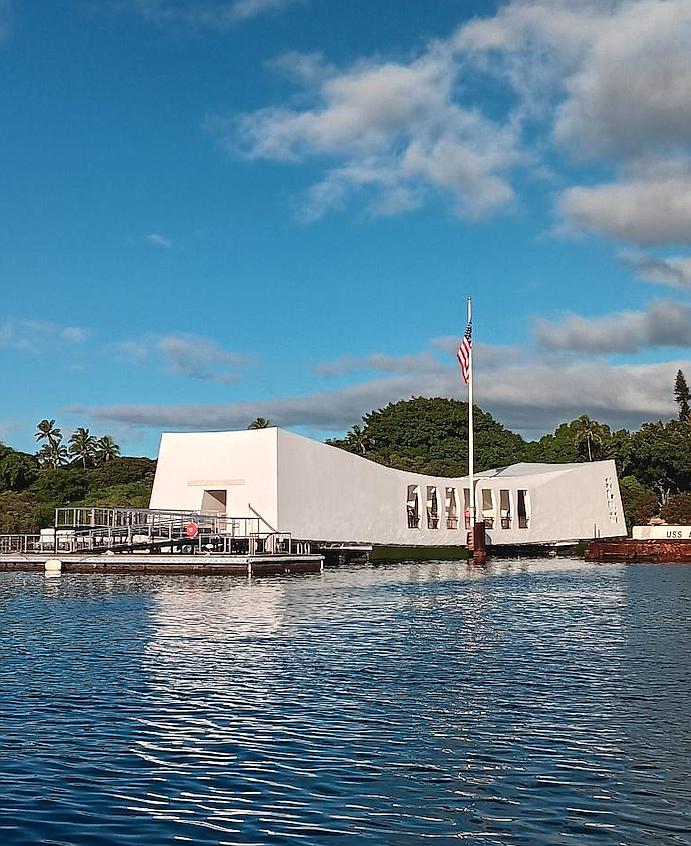 The USS Arizona Memorial, on top of the sunken Battleship USS Arizona at Battleship Row at Ford Island in the center of Pearl Harbor in Hawaii, is seen Monday. Today is Pearl Harbor Remembrance Day, a day to pay tribute to the lives lost during the Japanese military attack that plunged the U.S. into World War II 82 years ago.