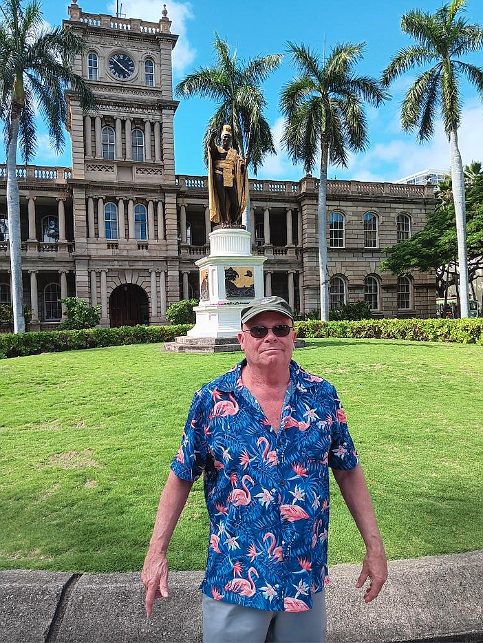 Lifelong Coeur d'Alene resident, Marine and son of a World War I sailor Randy Weiss is seen in front of the statue of King Kamehameha outside of Ali'iolani Palace in Honolulu. Weiss will be attending ceremonies at Pearl Harbor today.
