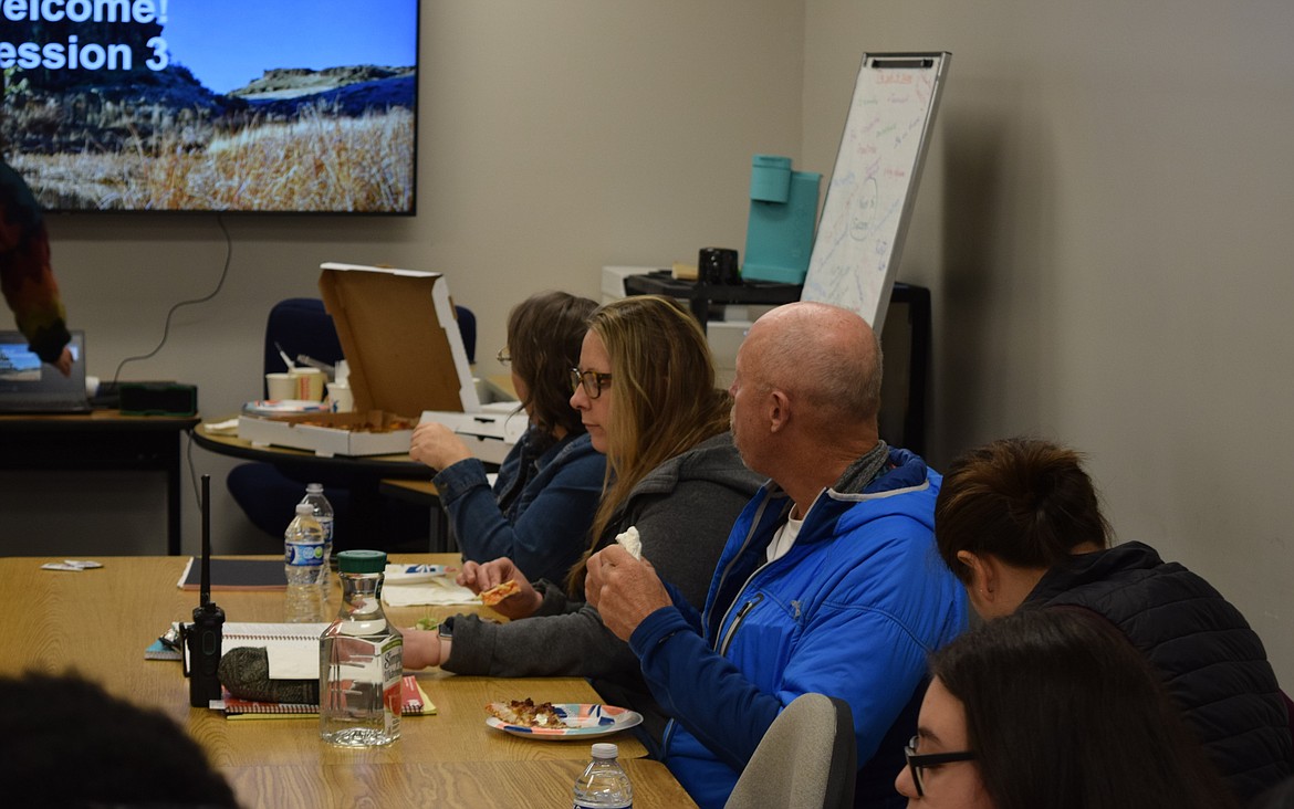 Cohort members of the Rural Community Leadership Program, led by Rural Development Initiatives, eat dinner before convening for the Nov. 30 in-person session held at SkillSource in Othello.