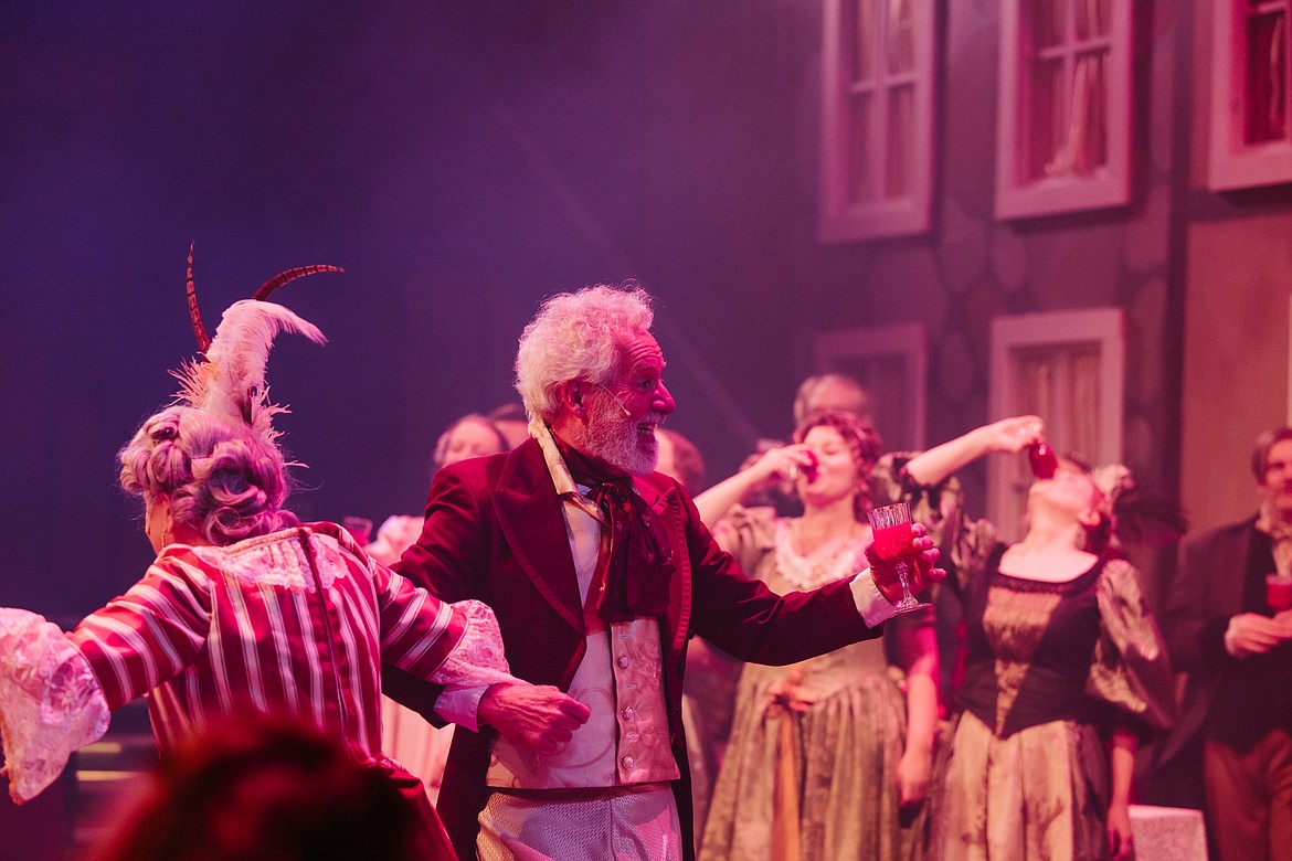 Tony Hernandez and Dianne Guenther, playing the part of Mr. and Mrs. Fezziwig, are seen dancing during a dress rehearsal for "A Christmas Carol," put on by Whitefish Theatre Company. (Photo courtesy of Matt Wetzler/Thewmatt Photography)