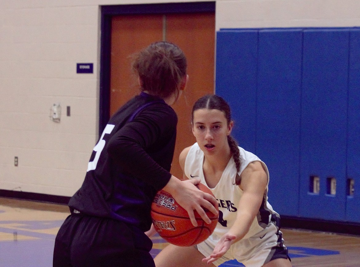 Brooke Petesch plays defense against Rogers on Dec. 6.