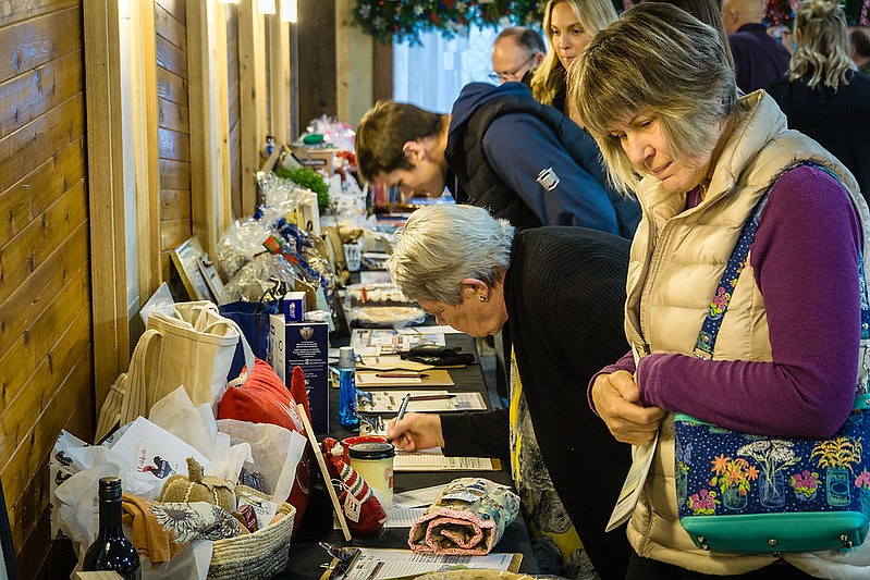 The Gathered in Gratitude auction featured a lot of items and a lot of interest from people attending.