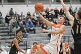 PREP BASKETBALL: Post Falls overcomes U-Hi — twice