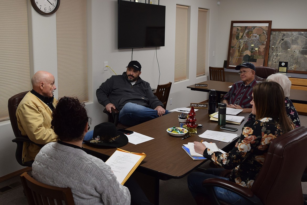 Port of Warden staff and commissioners discuss potential plans for renovating Warden Airport with Representative Tom Dent during Wednesday’s regular meeting at the port’s offices.