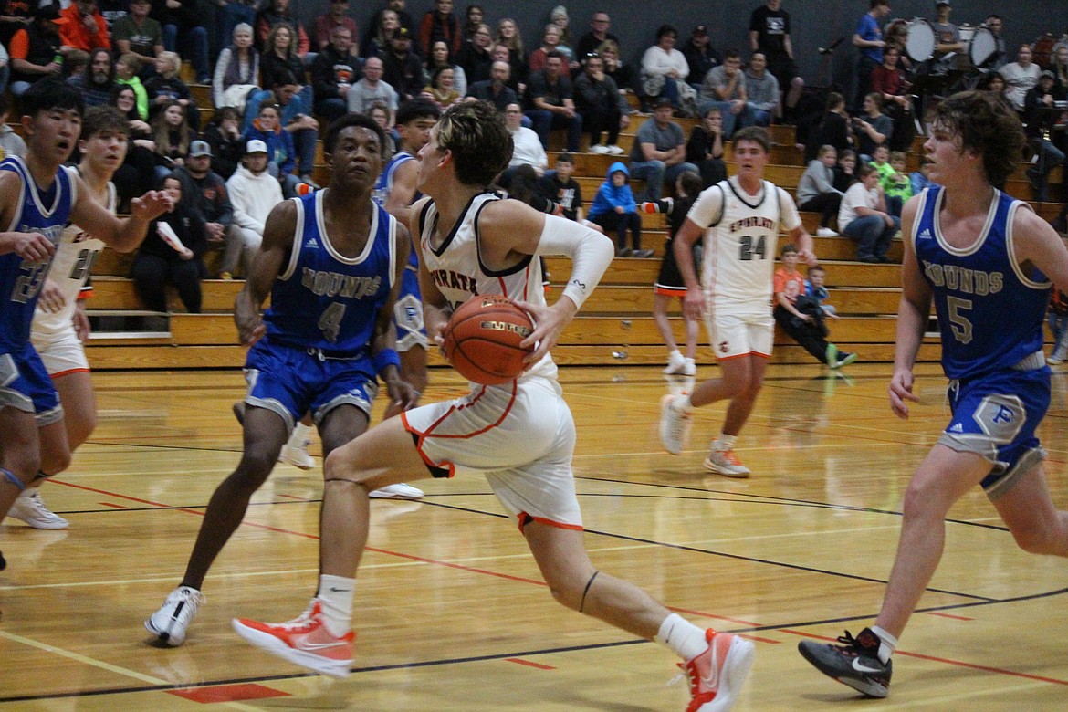 Hans Roberts drives to the basket in Ephrata's Dec. 2 game against Pullman.