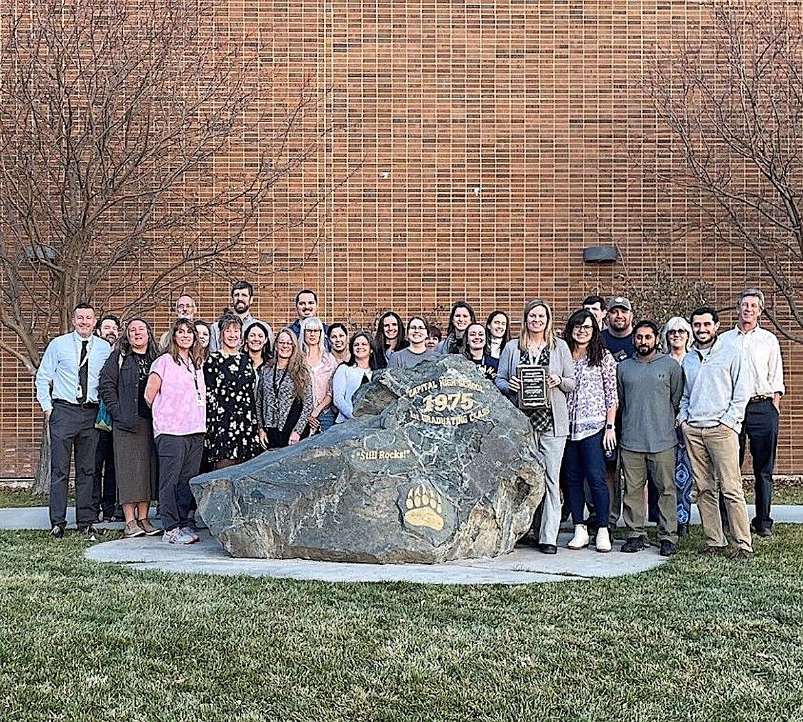 Helena Capital High School Assistant Principal Kathy Kidder and her co-workers celebrate her being named the Montana High School Assistant Principal of the Year. (Courtesy photo)