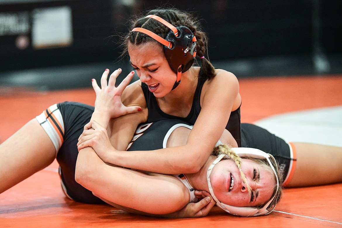 Flathead's Adi Siegel wrestles Ronan's Amanda Webster in a 114 lb. semifinal round matchup at the Flathead Girls Invitational Tournament at Flathead High School on Saturday, Dec. 9. (Casey Kreider/Daily Inter Lake)