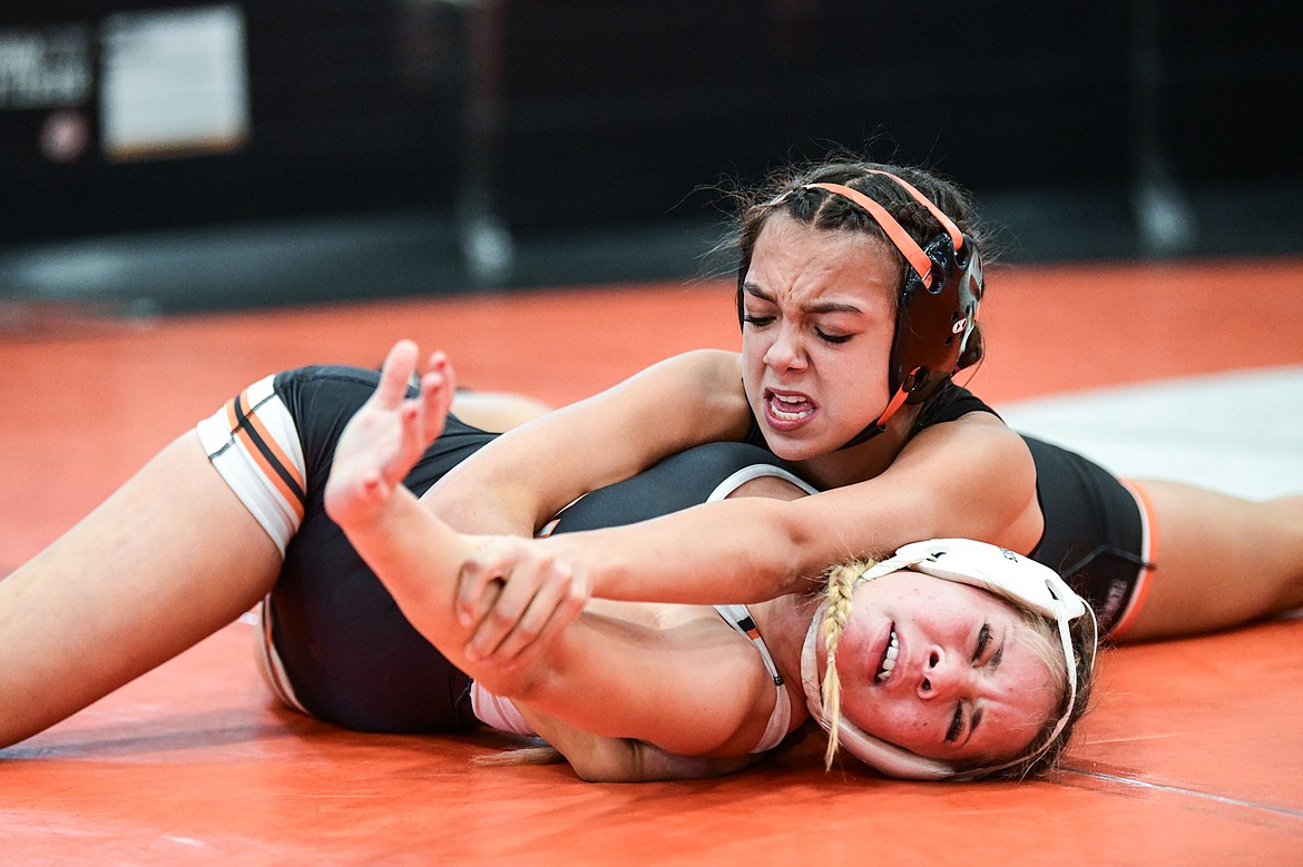 Flathead's Adi Siegel wrestles Ronan's Amanda Webster in a 114 lb. semifinal round matchup at the Flathead Girls Invitational Tournament at Flathead High School on Saturday, Dec. 9. (Casey Kreider/Daily Inter Lake)