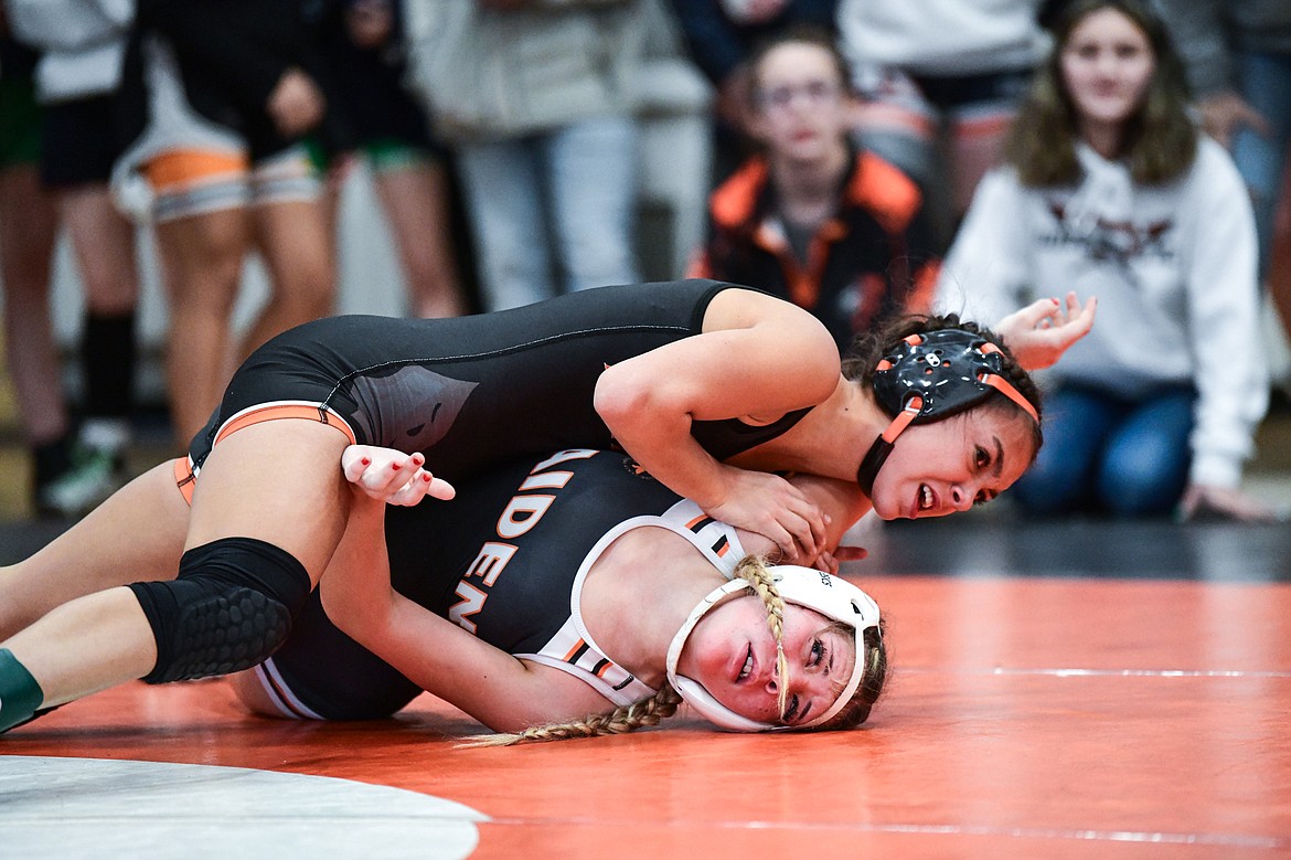 Flathead's Adi Siegel wrestles Ronan's Amanda Webster in a 114 lb. semifinal round matchup at the Flathead Girls Invitational Tournament at Flathead High School on Saturday, Dec. 9. (Casey Kreider/Daily Inter Lake)