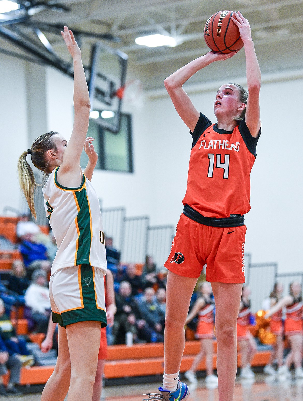 Flathead's Kennedy Moore (14) shoots in the first half against Great Falls CMR at Gene Boyle Gym on Saturday, Dec. 9. (Casey Kreider/Daily Inter Lake)