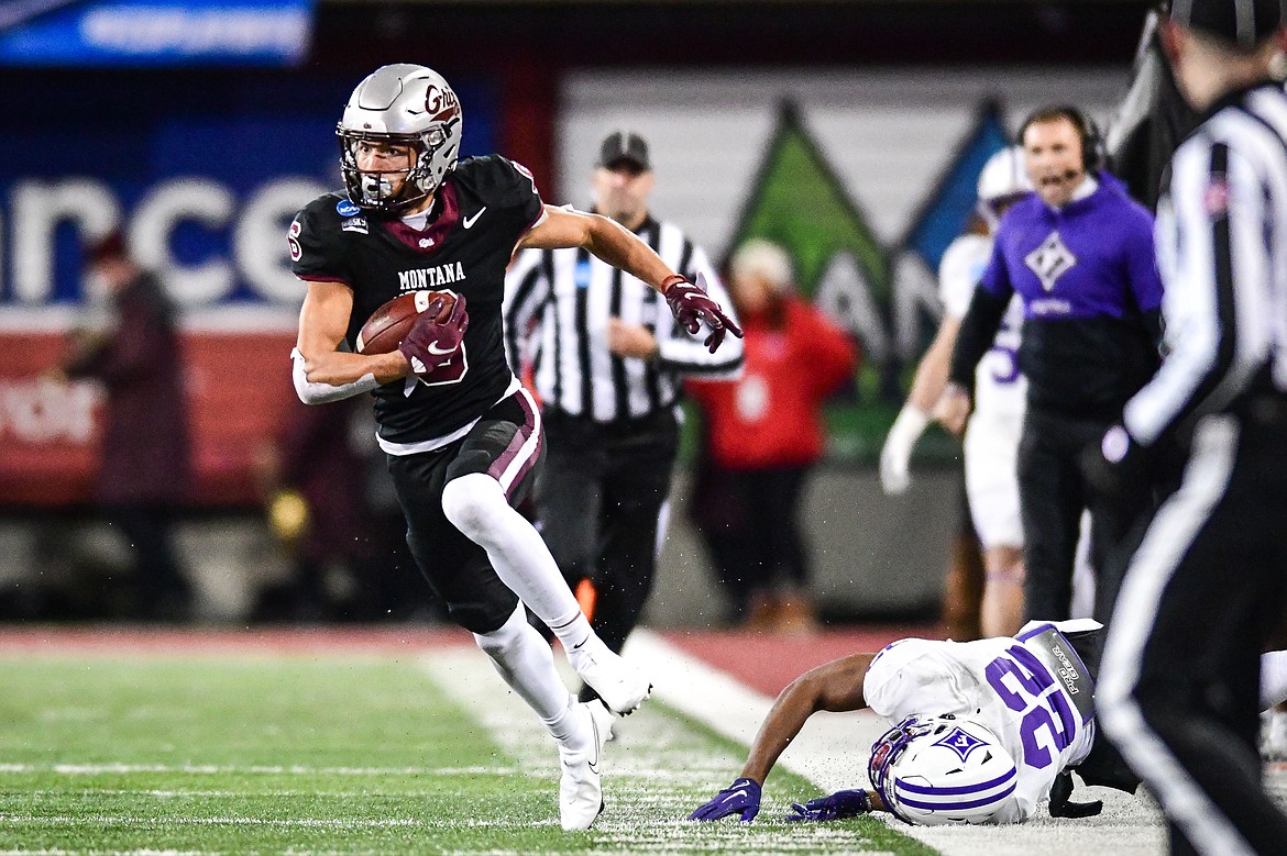 Grizzlies wide receiver Keelan White (6) breaks a tackle and heads upfield on a 42-yard reception in the second quarter of an FCS Playoff game against Furman at Washington-Grizzly Stadium on Friday, Dec. 8. (Casey Kreider/Daily Inter Lake)