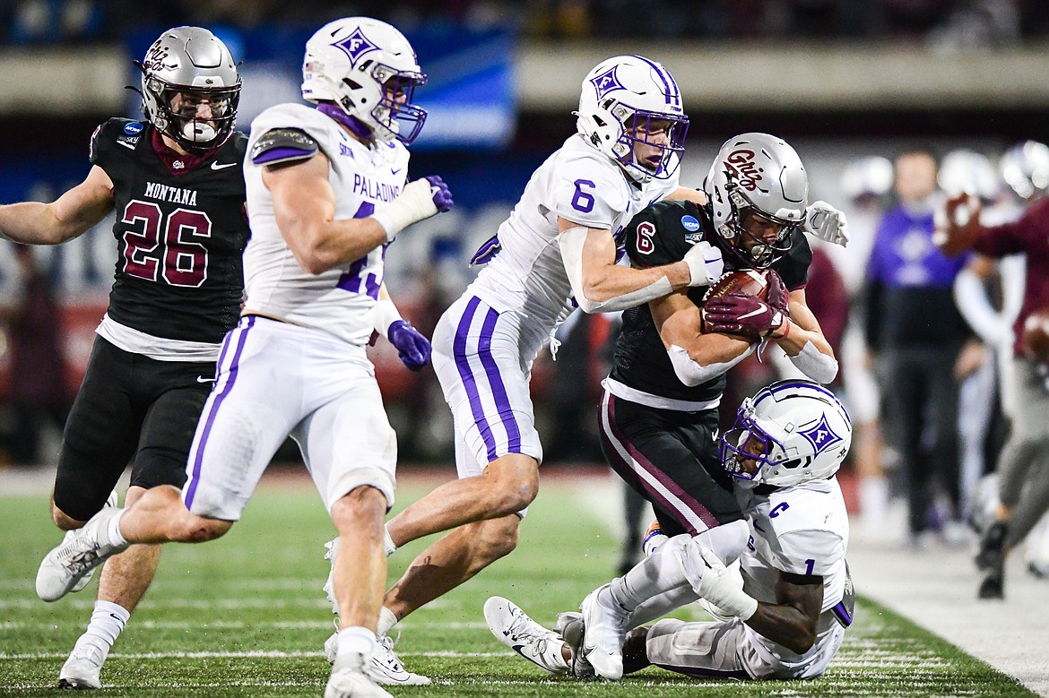 Grizzlies wide receiver Keelan White (6) is brought down on a 42-yard reception in the second quarter of an FCS Playoff game against Furman at Washington-Grizzly Stadium on Friday, Dec. 8. (Casey Kreider/Daily Inter Lake)