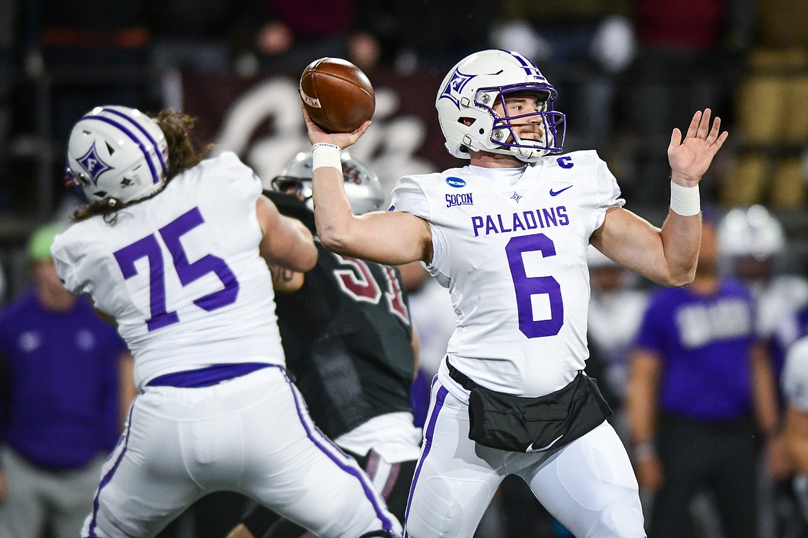 Furman quarterback Tyler Huff (6) completes a 70-yard pass to wide receiver Colton Hinton in the first quarter of an FCS Playoff game against Montana at Washington-Grizzly Stadium on Friday, Dec. 8. (Casey Kreider/Daily Inter Lake)