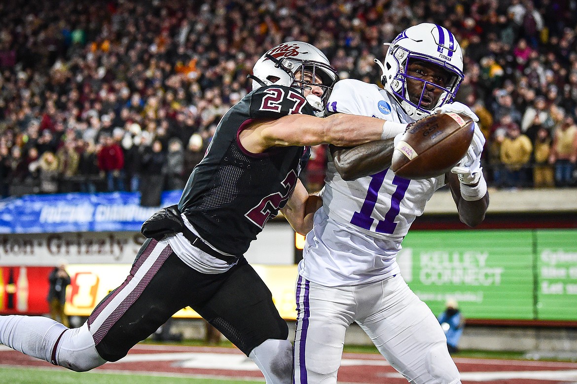 Grizzlies cornerback Trevin Gradney (27) knocks down a fourth-down pass attempt to Furman wide receiver Kyndel Dean (11) in overtime of an FCS Playoff game against Furman at Washington-Grizzly Stadium on Friday, Dec. 8. (Casey Kreider/Daily Inter Lake)