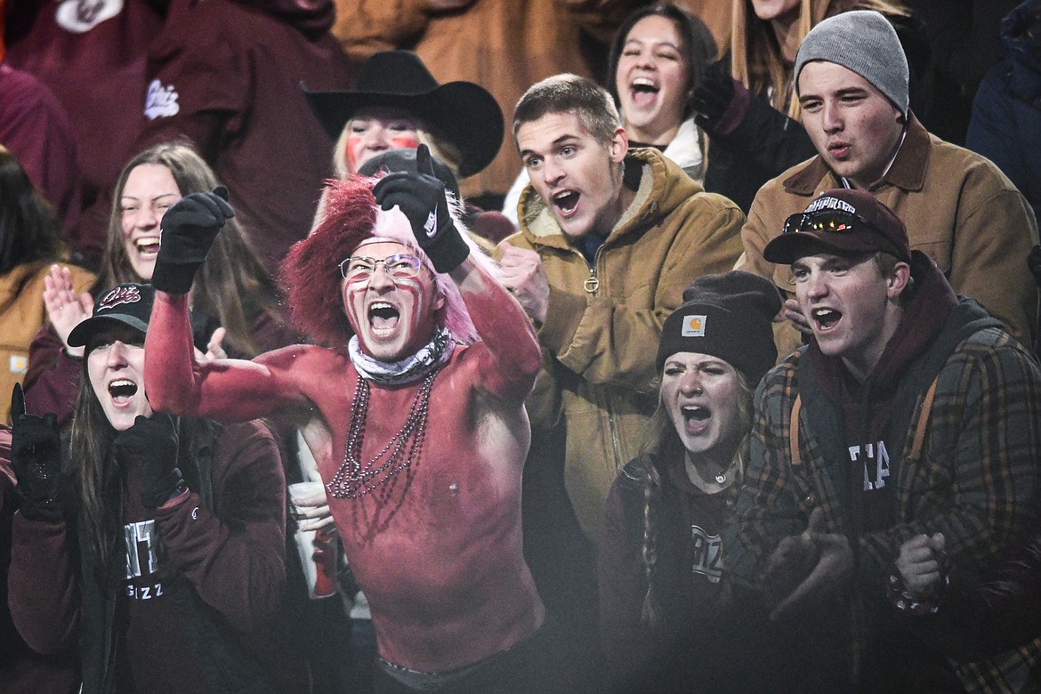 Griz fans cheer on Montana during the first quarter of an FCS Playoff game against Furman at Washington-Grizzly Stadium on Friday, Dec. 8. (Casey Kreider/Daily Inter Lake)
