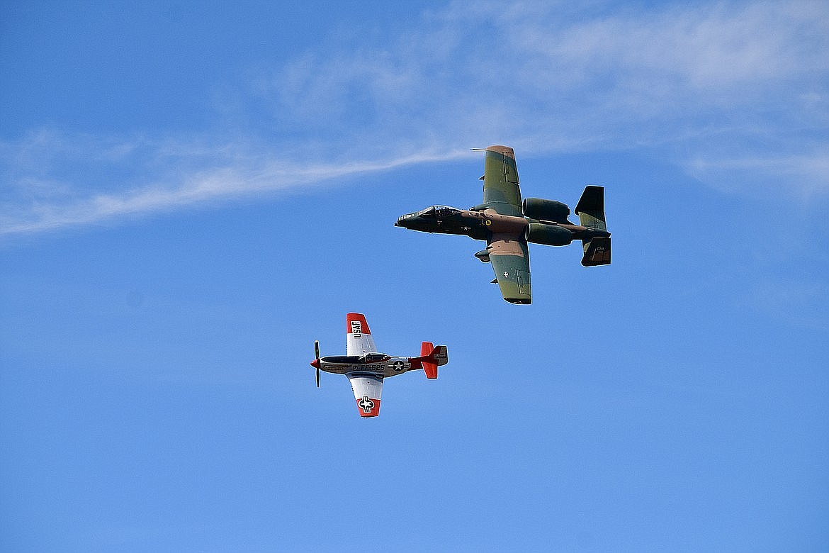 An A10 Warthog, green, and another aircraft fly over Moses Lake during a past Moses Lake Airshow. The airshow is developing a significant following, Grant County Tourism Commission Chair Amanda Laramore said. It is one of many events in the county the commission works to support.