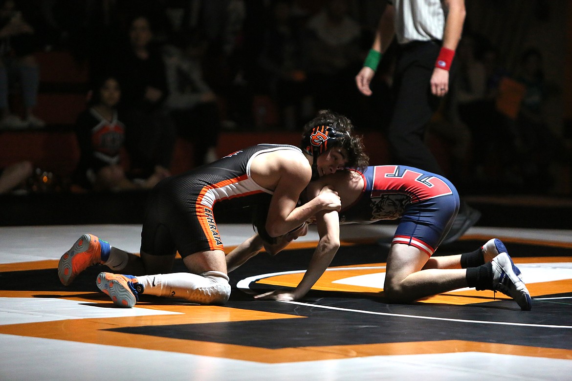 Ephrata senior Jorge Rodriguez, left, opened Thursday’s dual against Ellensburg with a pin in the first round.