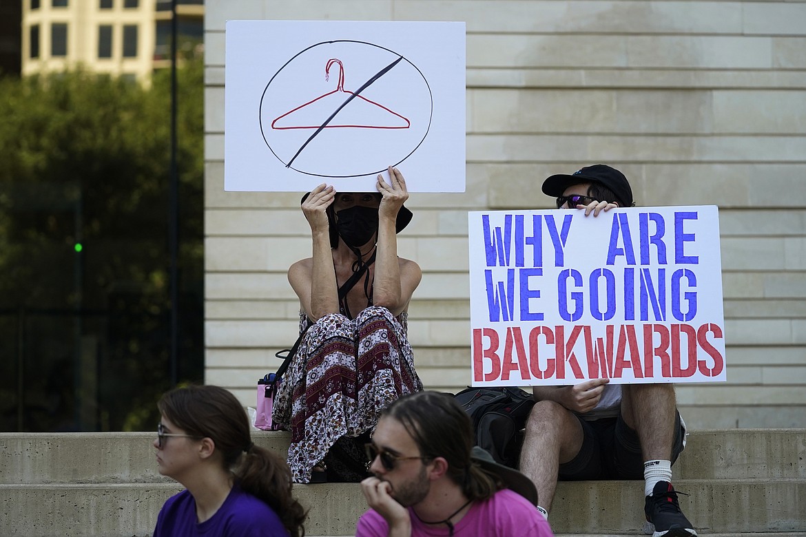 Demonstrators gather at the federal courthouse in Austin, Texas, following the U.S. Supreme Court's decision to overturn Roe v. Wade, June 24, 2022. A pregnant Texas woman whose fetus has a fatal diagnosis asked a court Tuesday, Dec. 5, 2023, to let her terminate the pregnancy, bringing what her attorneys say is the first lawsuit of its kind in the U.S. since Roe v. Wade was overturned last year. (AP Photo/Eric Gay, File)