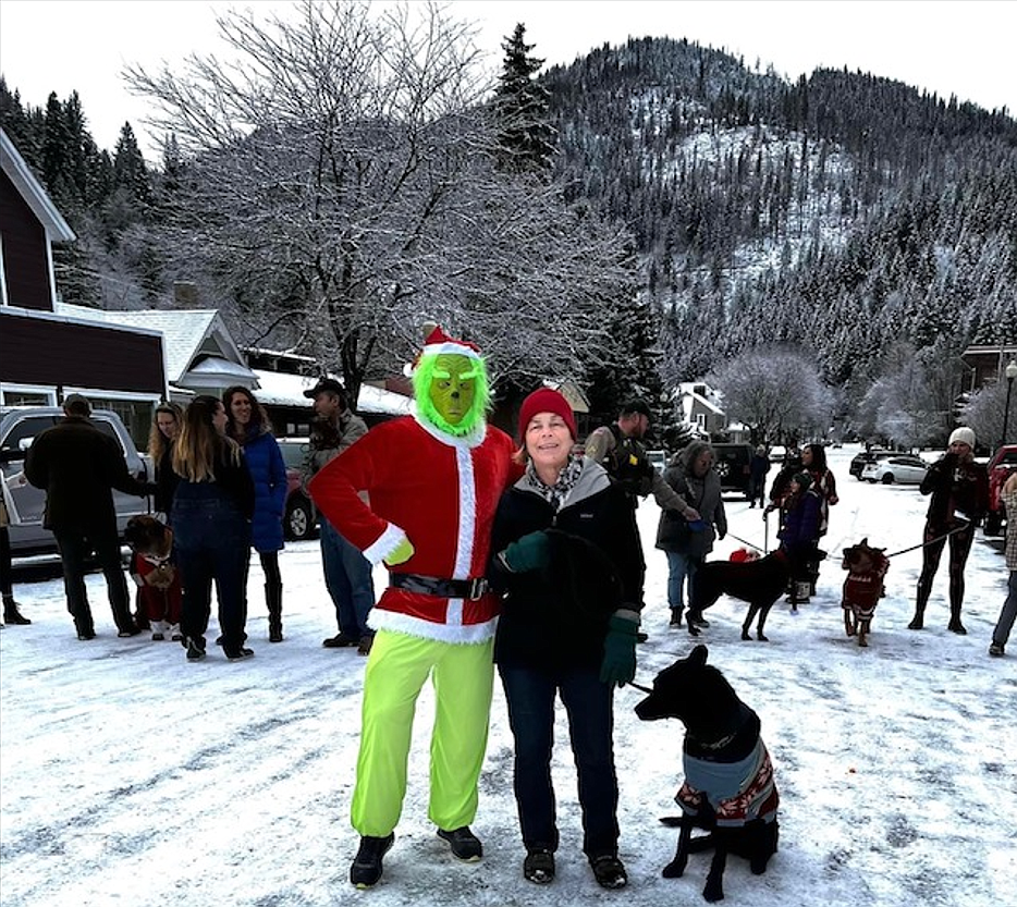 The Grinch posed with Kim Johnson from Shoshone Pet Rescue and Darrin the dog. Darrin is looking for a forever home.