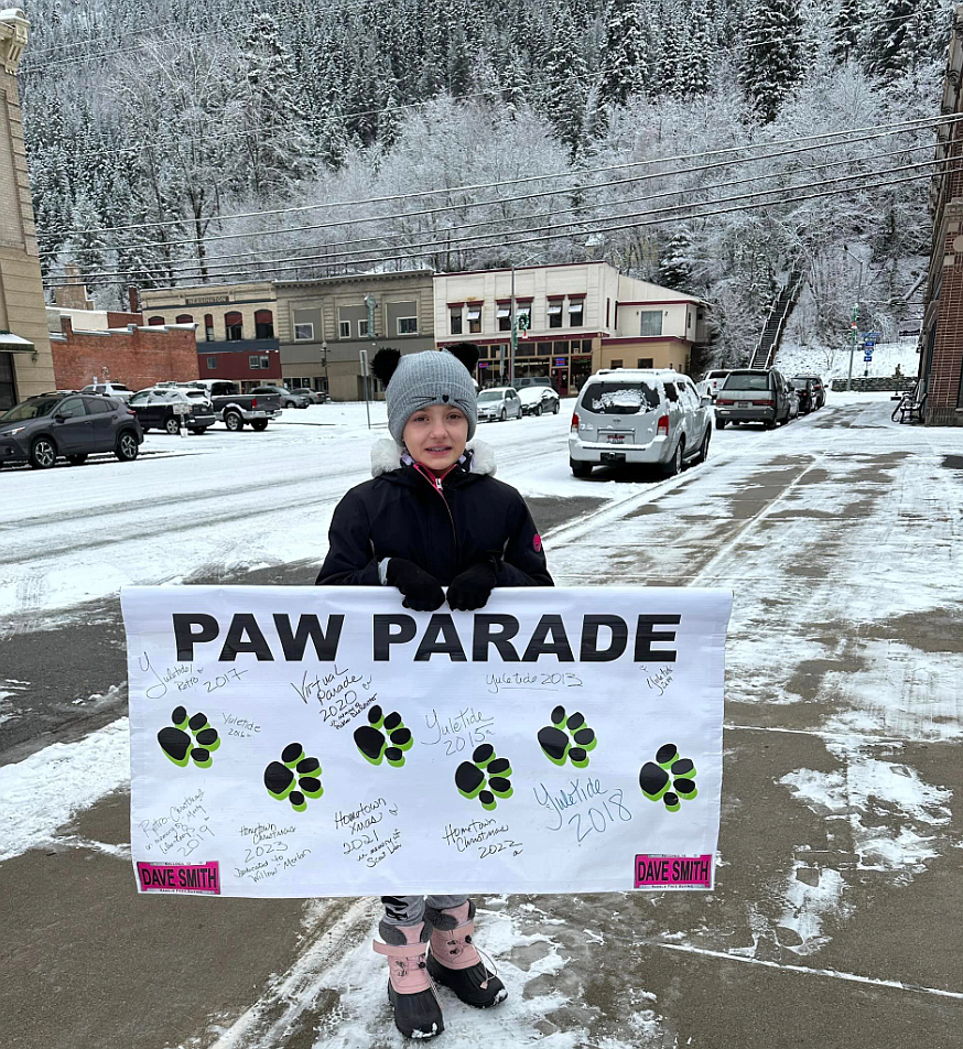 Madison Johnson was the banner bearer for the Paw Parade.