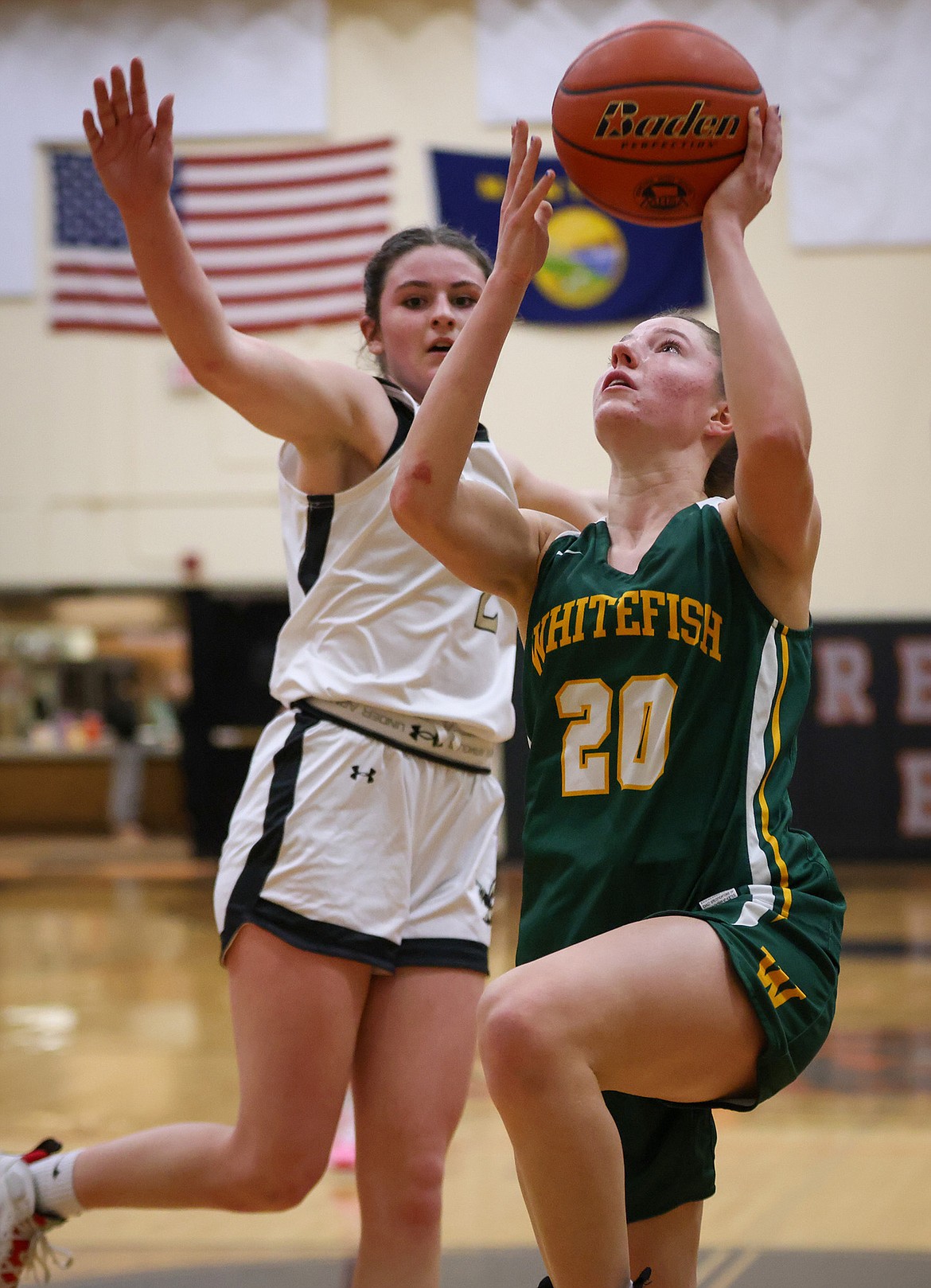 Hailey Ells goes to the basket against Stevensville’s Cheyenne Sannar at the Western A Tip Off in Frenchtown Friday. (Jeremy Weber/Bigfork Eagle)