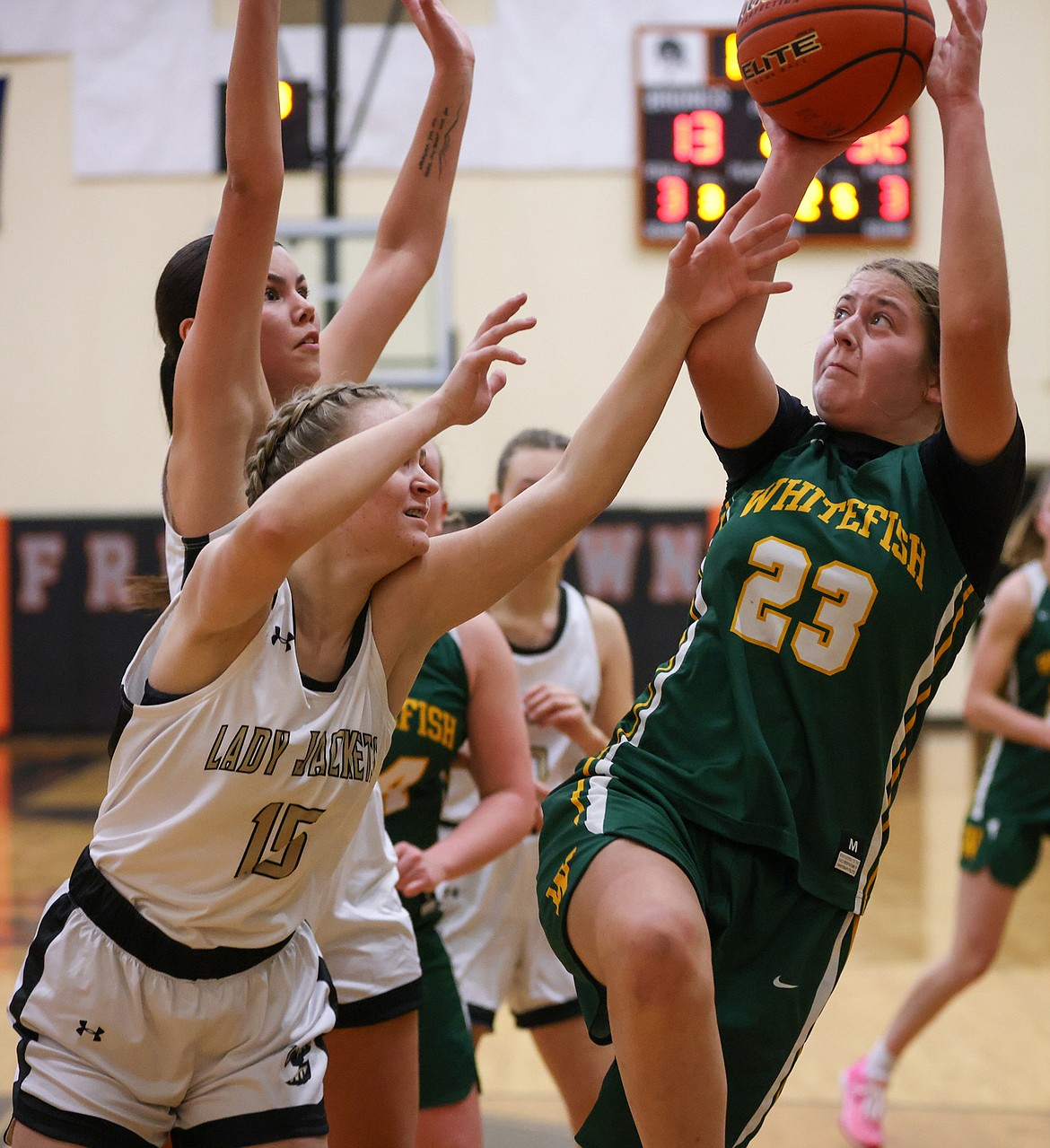 Charlize Ullrich goes up for a shot over Stevensville’s Emma McKoy at the Western A Tip Off in Frenchtown Friday. (Jeremy Weber/Bigfork Eagle)