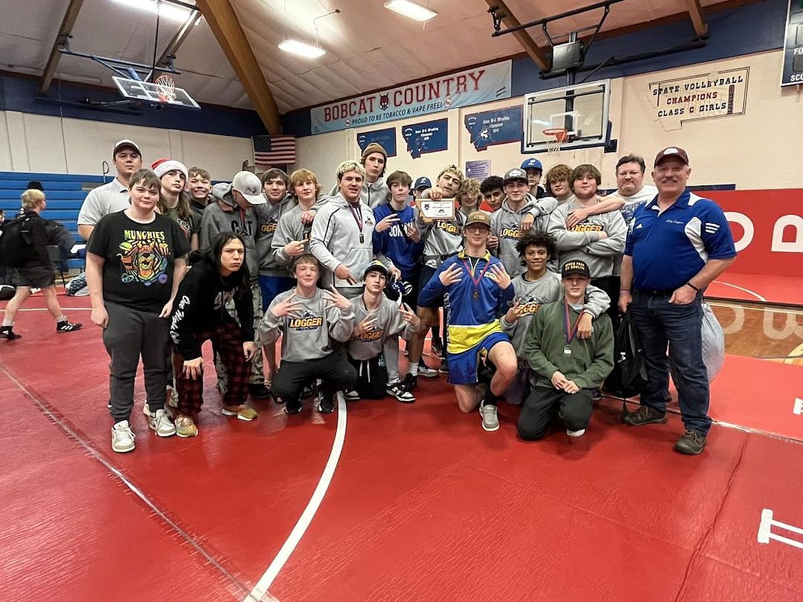 The Libby Greenchain wrestlers celebrated a second-place finish at the Bob Kinney Classic in Superior on Saturday, Dec. 9. (Photo courtesy Libby High School)