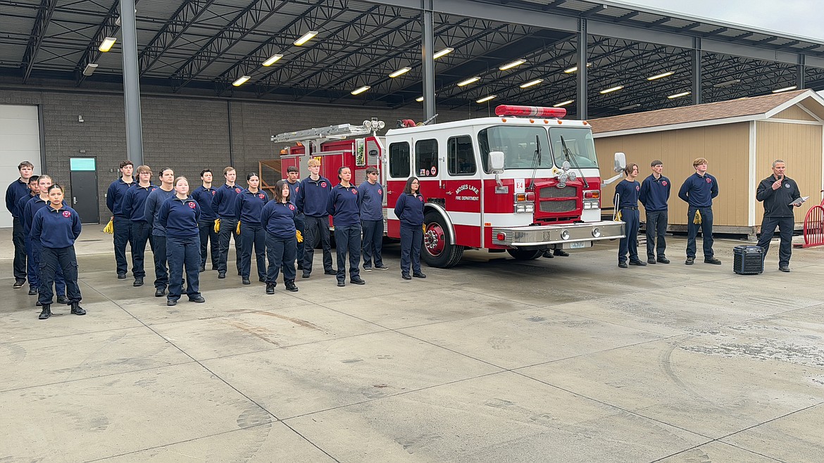 Skills center fire science students listen carefully as the class receives a fire engine from the Moses Lake Fire Department.