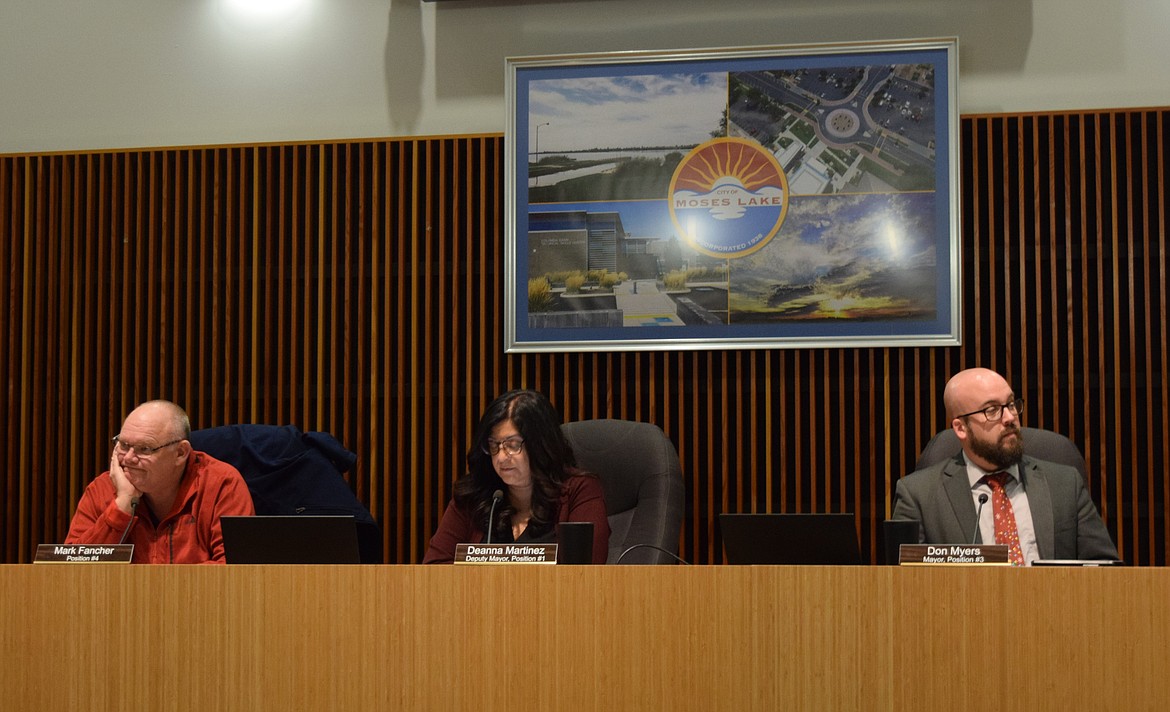 Council member Mark Fancher, Deputy Mayor Deanna Martinez and Mayor Don Myers listen to staff reports during Tuesday’s regular Moses Lake City Council meeting.