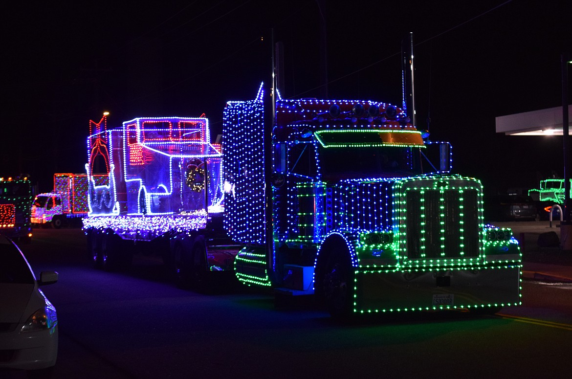 A Lower Yakima Valley truck with Christmas light decorations rolls down Boundary Avenue on its way to the end of the parade at Wahluke High School December 8.