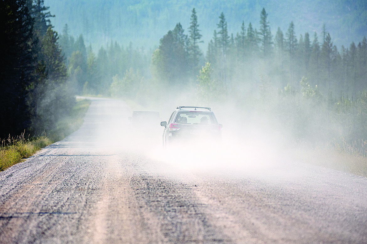 A car drives up the North Fork Road. (Hungry Horse News FILE)