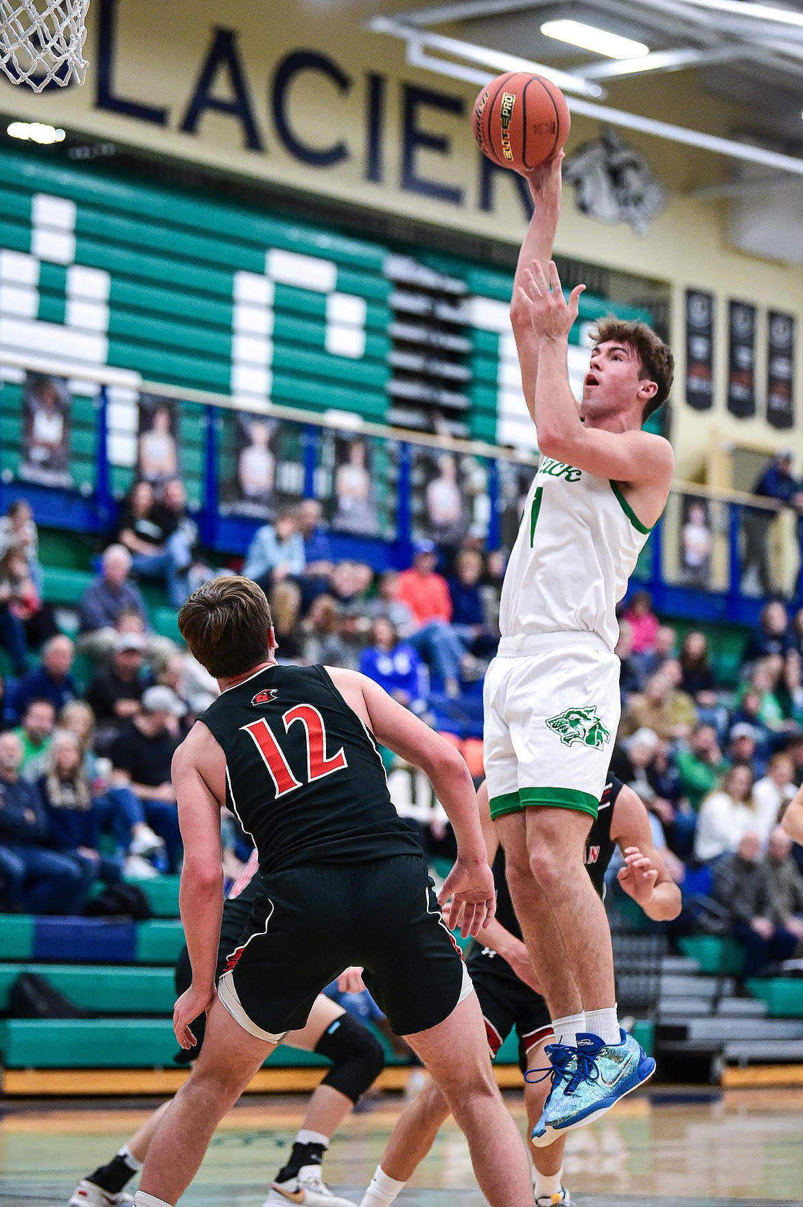 Glacier's Cohen Kastelitz (1) looks to shoot in the lane against Bozeman in the first quarter at Glacier High School on Friday, Dec. 15. (Casey Kreider/Daily Inter Lake)