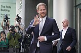 Prince Harry claims vindication in court victory as judge finds British tabloid hacked his phone
