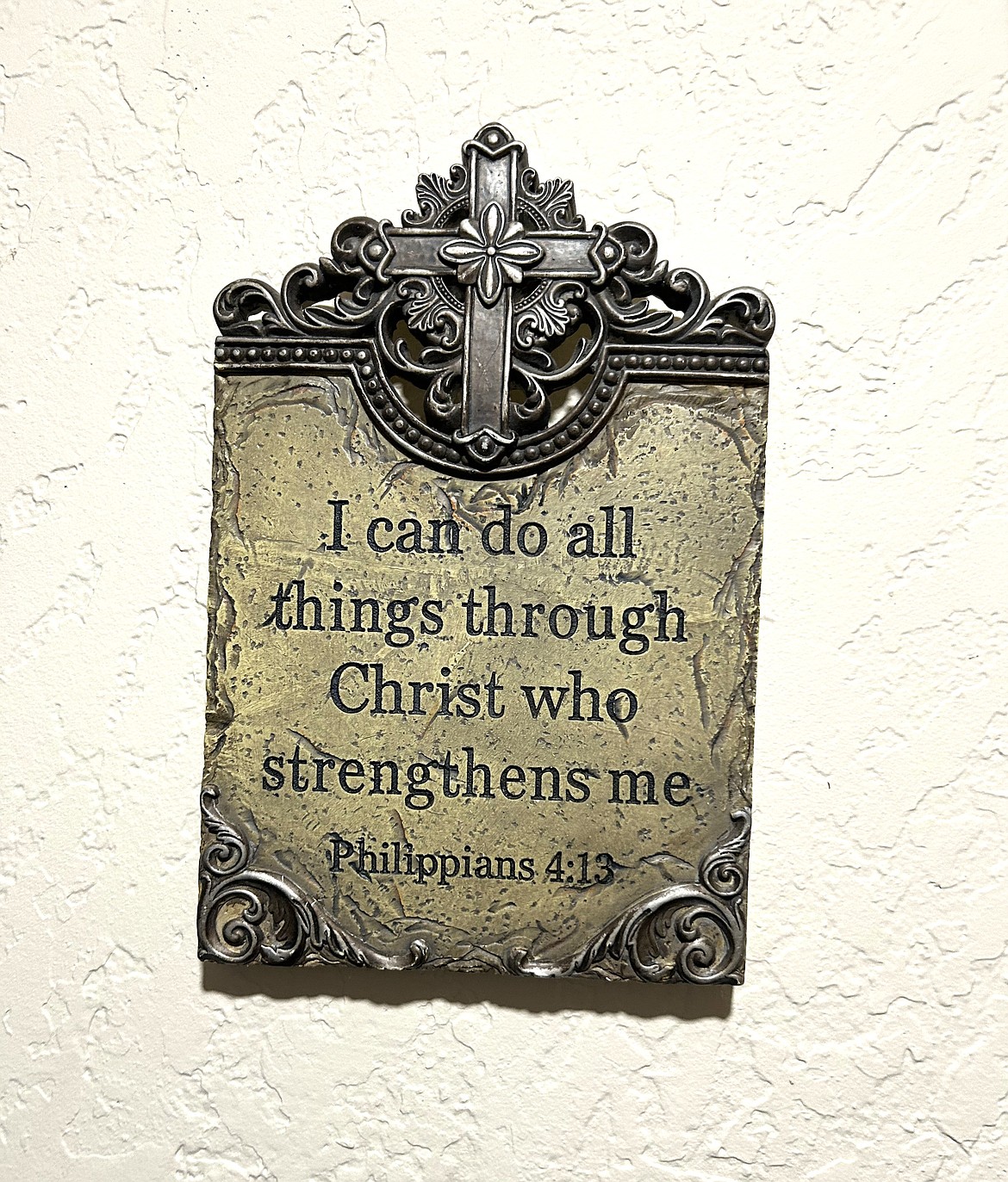 A Bible verse hangs on the wall of The Way Home CDA living room.