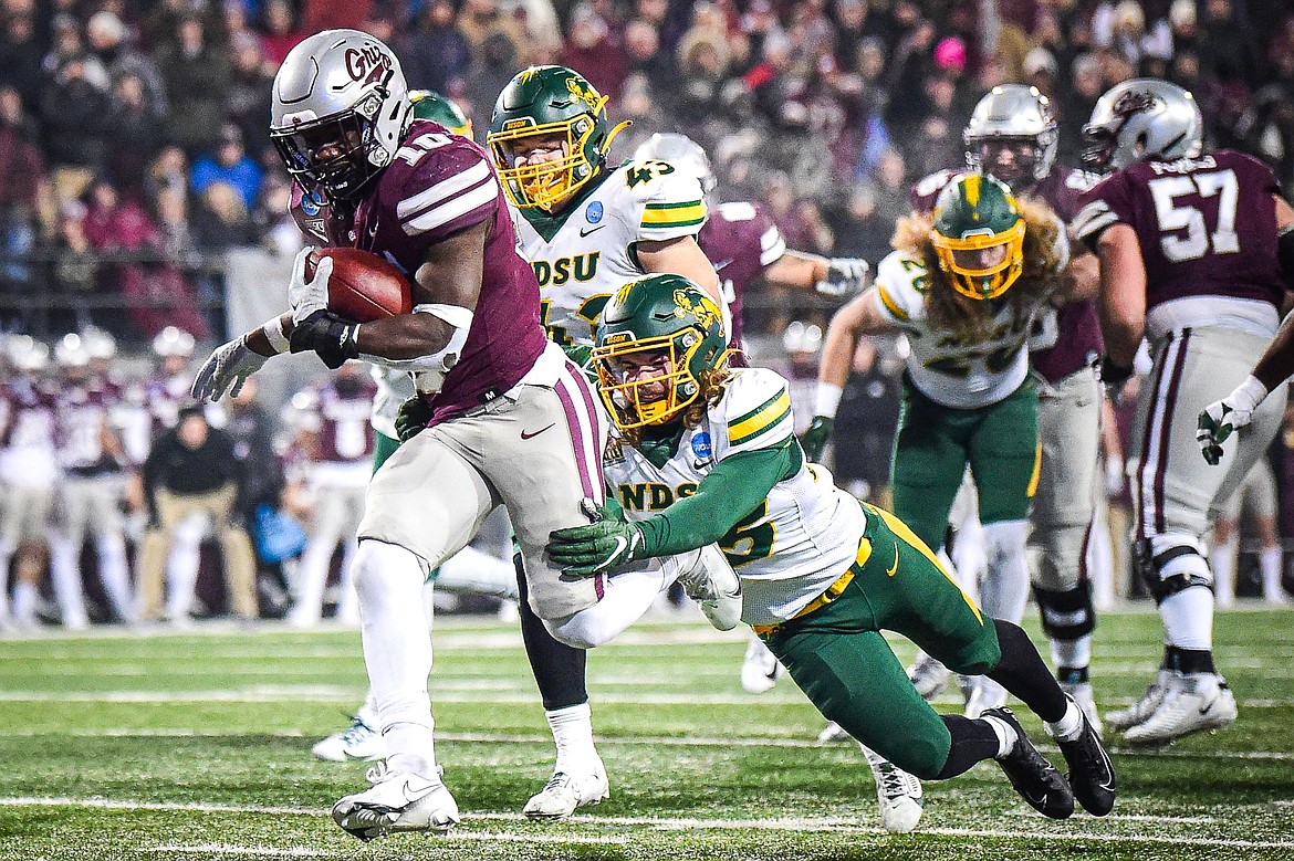 Grizzlies running back Eli Gillman (10) scores a touchdown on a 13-yard run in overtime against North Dakota State in the FCS semifinals at Washington-Grizzly Stadium on Saturday, Dec. 16. (Casey Kreider/Daily Inter Lake)