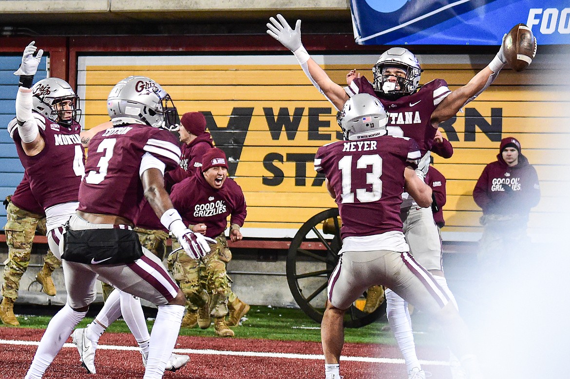 Grizzlies cornerback Corbin Walker (8) celebrates with teammates after intercepting a pass in overtime against North Dakota State in the FCS semifinals at Washington-Grizzly Stadium on Saturday, Dec. 16. (Casey Kreider/Daily Inter Lake)(