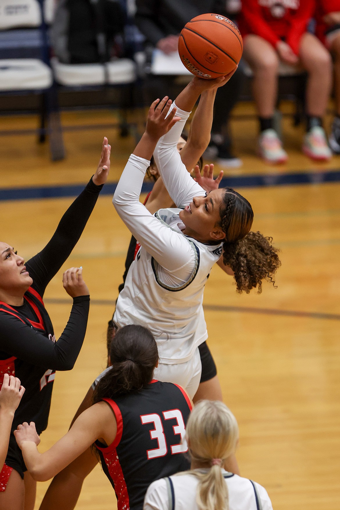 JASON DUCHOW PHOTOGRAPHY
Lake City senior KaLiah Frazey goes up for a shot in the lane against North Central on Saturday at Lake City.