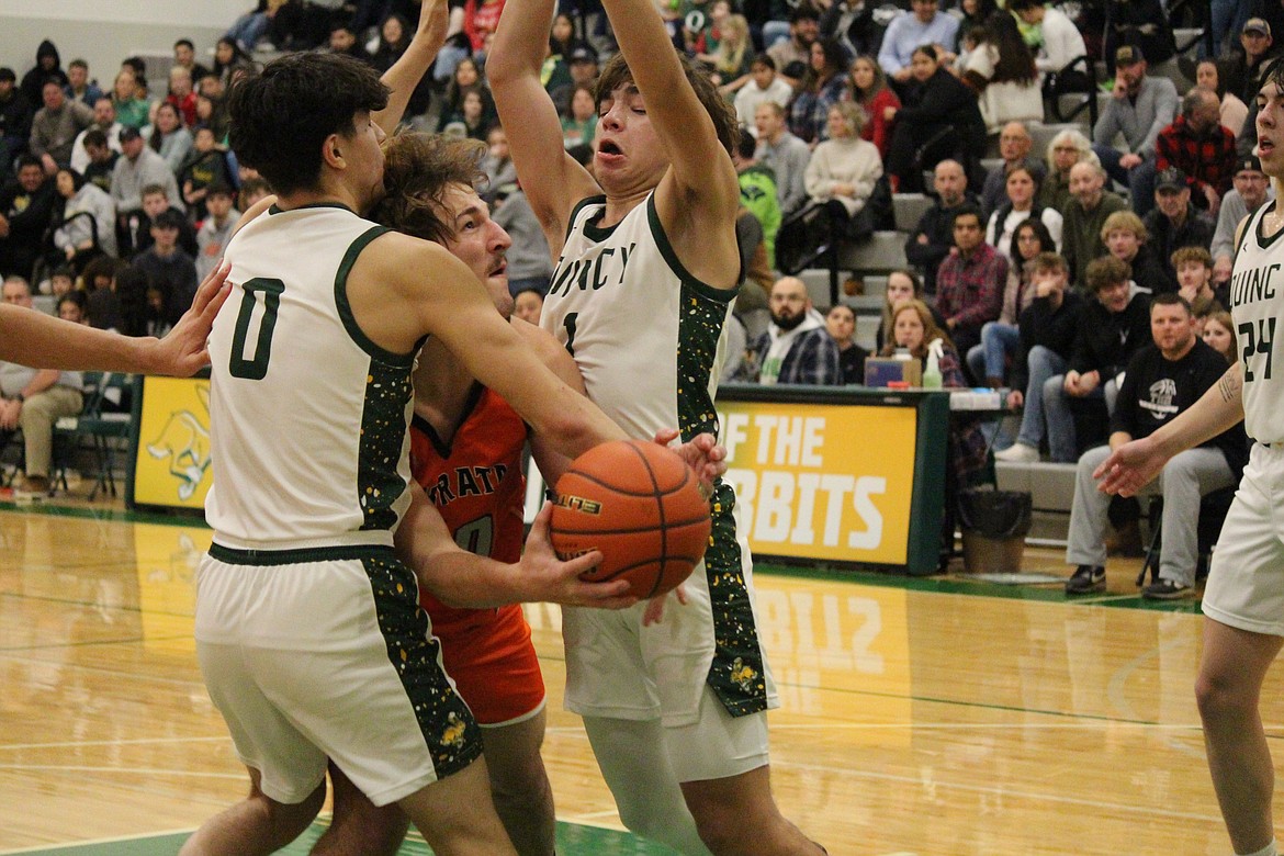 Quincy Coach Scott Bierlink said the Jacks’ good defense was a major factor in Quincy’s win over Ephrata. Dom Trevino (0) and Pierce Bierlink (1) choke off an Ephrata drive.