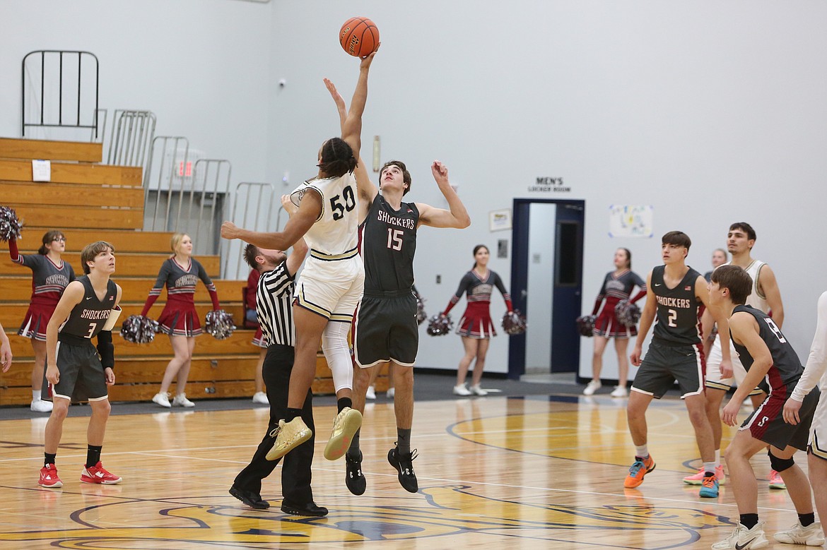 MLCA/CCS senior Caleb Jones (50) controls the opening tip against Waterville-Mansfield.