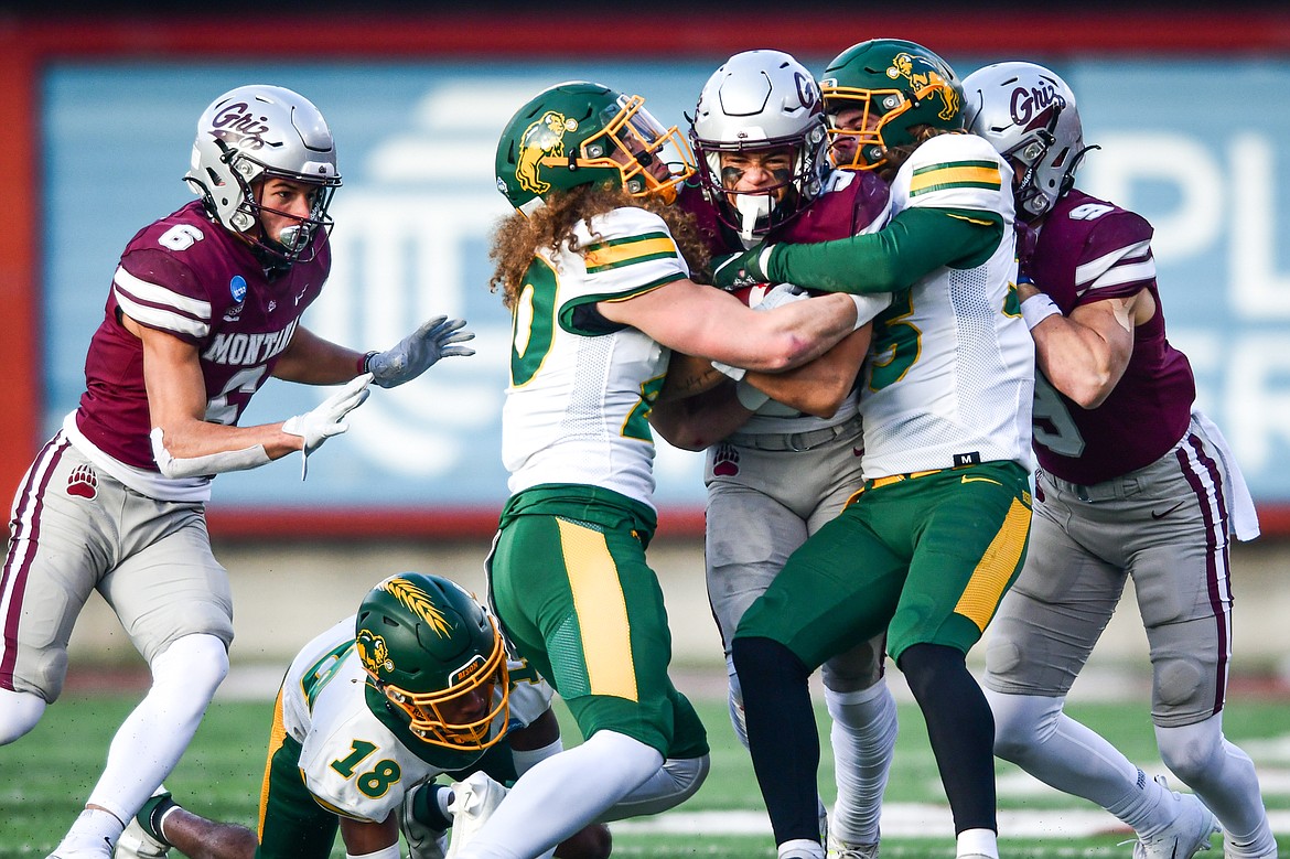 Grizzlies wide receiver Junior Bergen (5) fights for extra yards after a reception in the second quarter against North Dakota State in the FCS semifinals at Washington-Grizzly Stadium on Saturday, Dec. 16. (Casey Kreider/Daily Inter Lake)