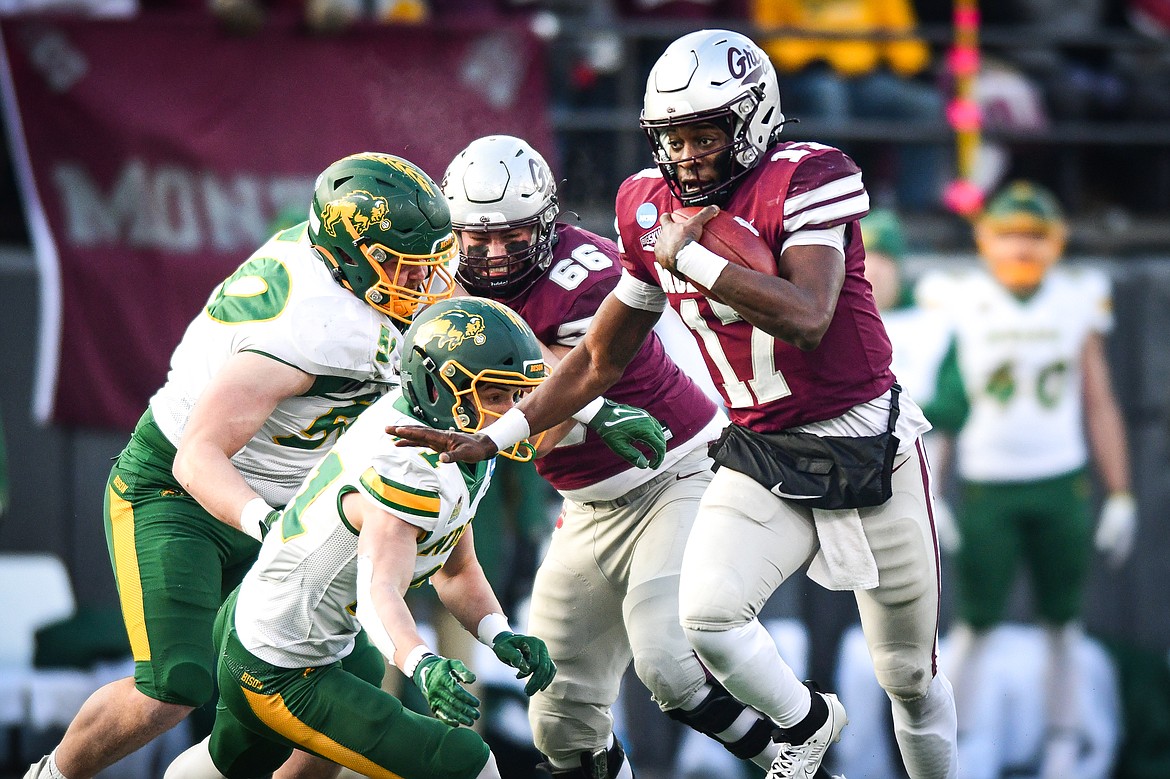 Grizzlies quarterback Clifton McDowell (17) picks up yardage on a run in the second quarter against North Dakota State in the FCS semifinals at Washington-Grizzly Stadium on Saturday, Dec. 16. (Casey Kreider/Daily Inter Lake)